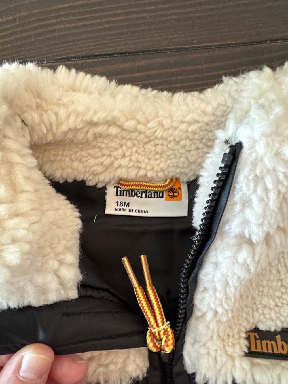 Timberland Kids Black & Cream Puffer Vest with Gray Logo Tee and Tan Joggers - Picture 3 of 8